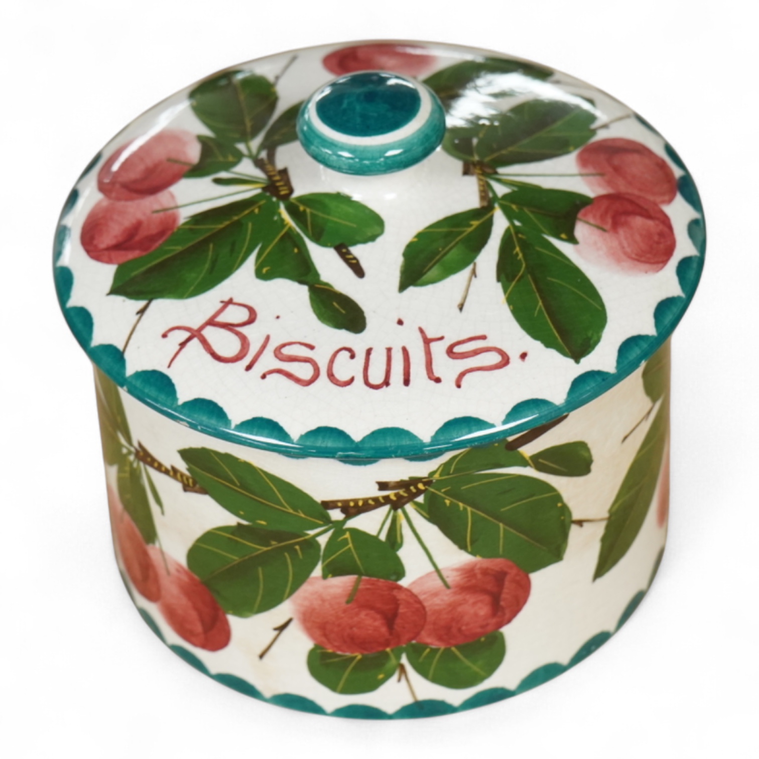 A Wemyss lidded biscuits box, 13cm diameter